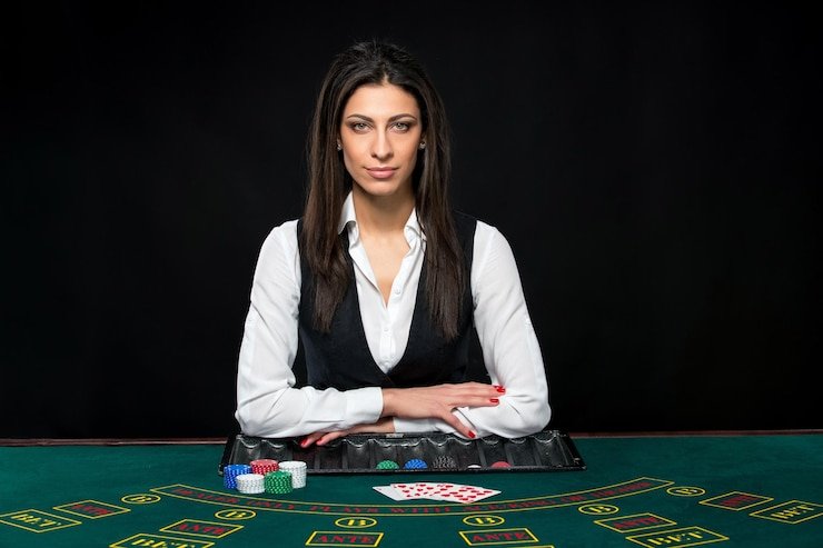Live dealer at a baccarat table on rajaburma88 link platform